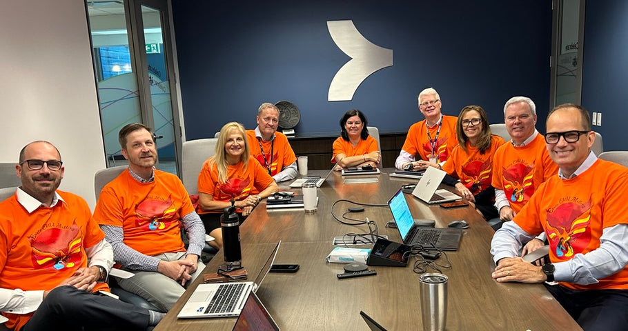 Corporate_Orders_Page_Photo_BGIS_Orange_TShirts